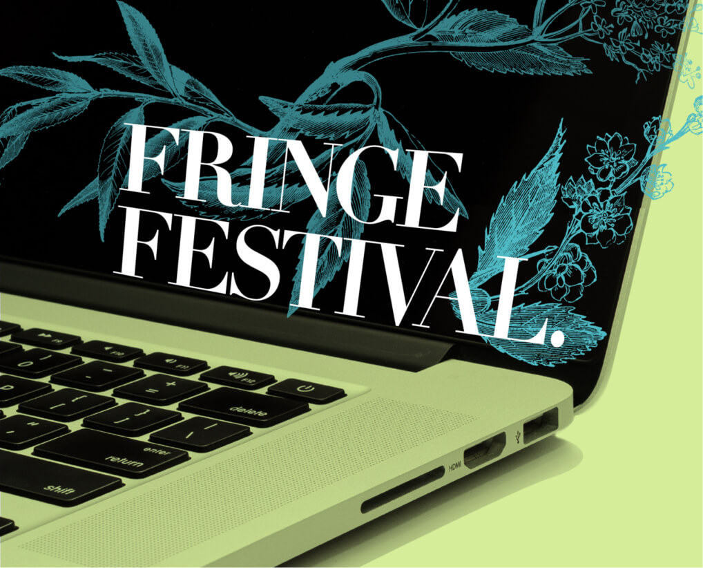 Photo of Macintosh laptop with flowery screen saver and text Fringe Festival. on screen